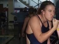 Getting pumped up to swim at a swim meet in 2005.